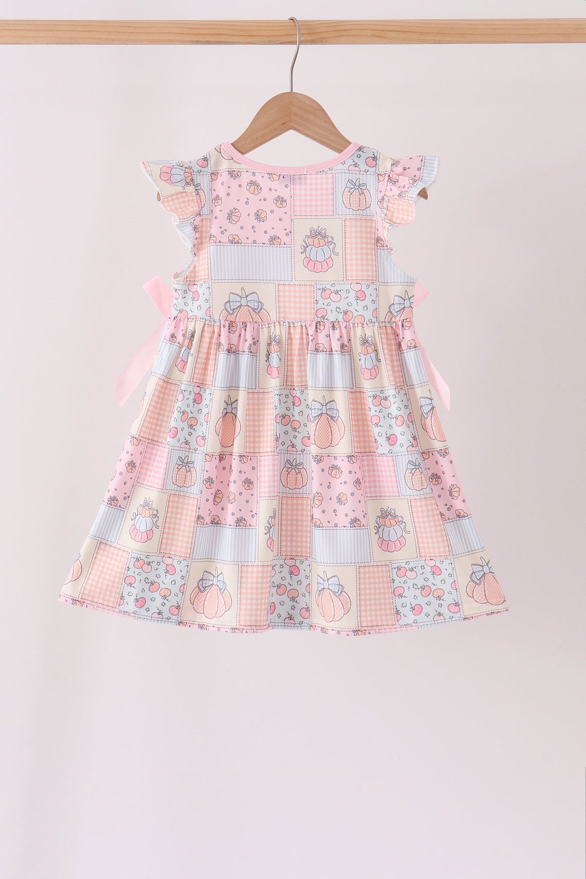 Pink pumpkin print ruffle dress