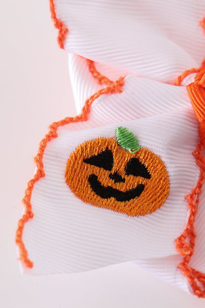 Orange Jack-O-Lantern embroidery crochet edge hair bow