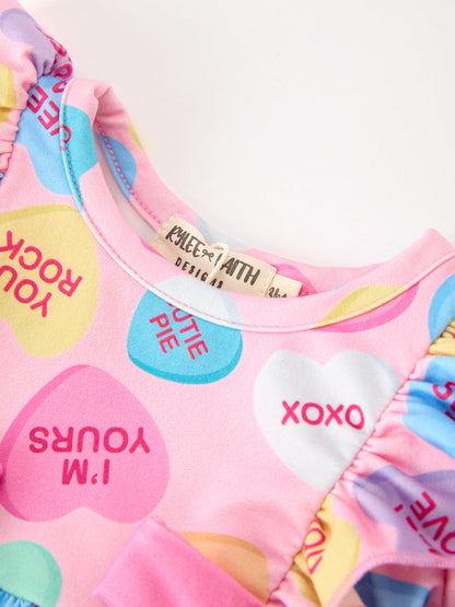Valentine’s Day Girls Conversation Heart Print Bow Romper