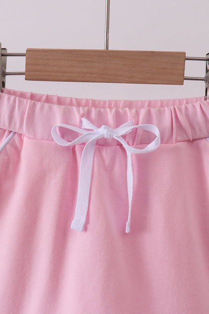 Pink scallop hem bow skort