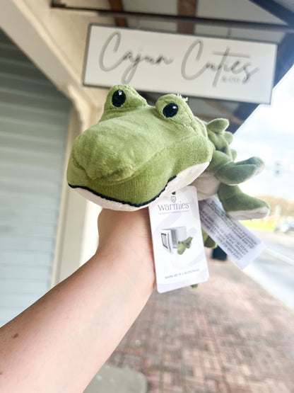 Soft plush alligator Warmie, microwavable and lavender-scented for soothing warmth and relaxation, perfect for cuddly comfort.
