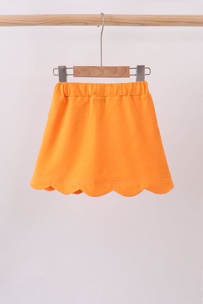 Orange scallop hem bow skort