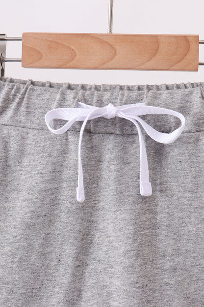 Grey scallop hem bow skort