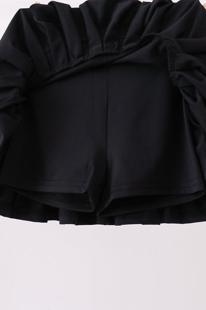 Black pleated skort