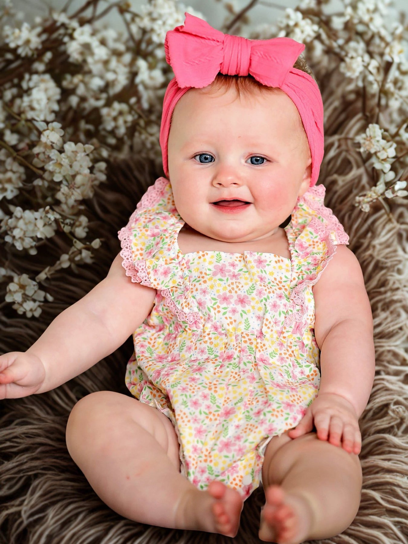 Floral Girls Smocked Ruffle Romper
