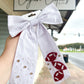 Football hair bow - Cajun Cuties & Co