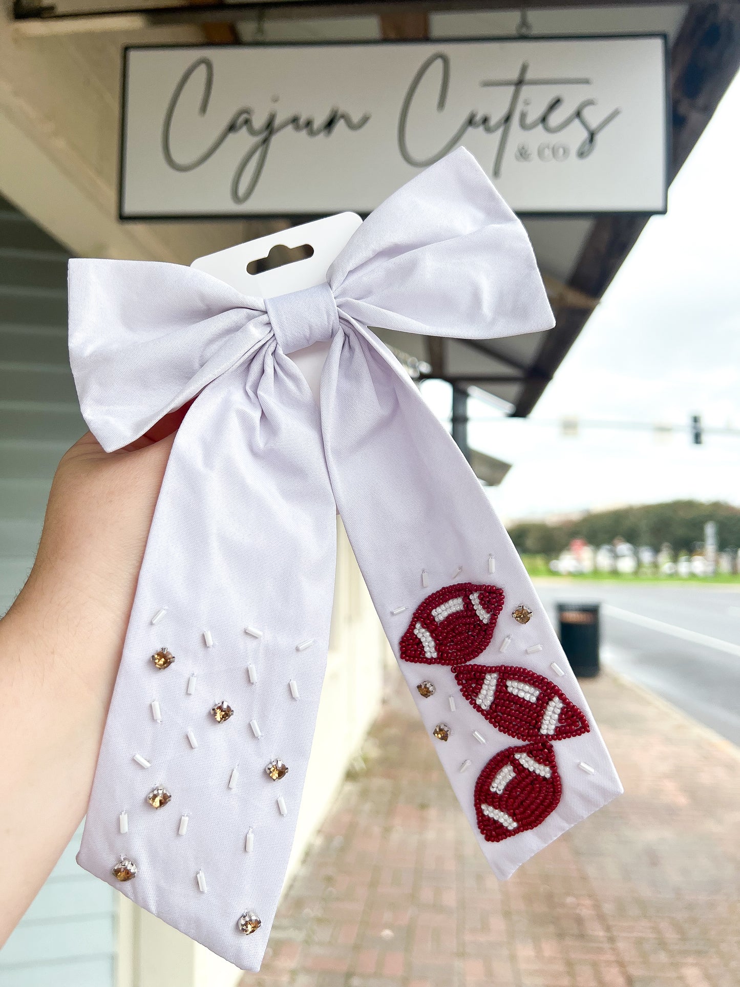 Football hair bow - Cajun Cuties & Co