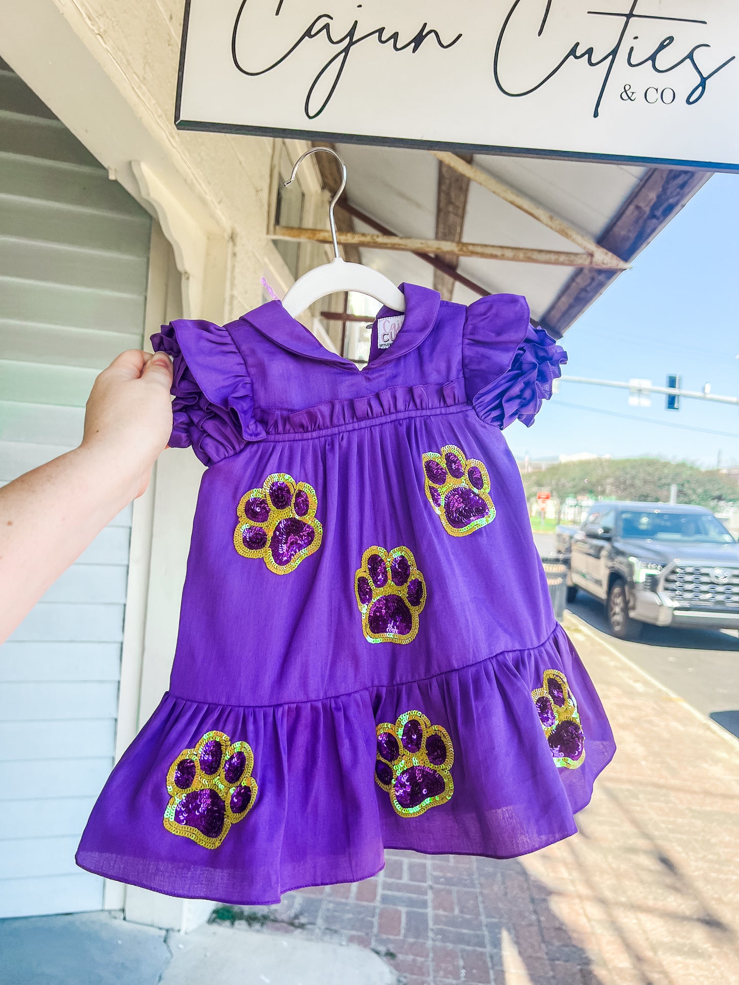 Child's tiger paw sequin dress with matching bloomers, perfect for playful outings and spirited events