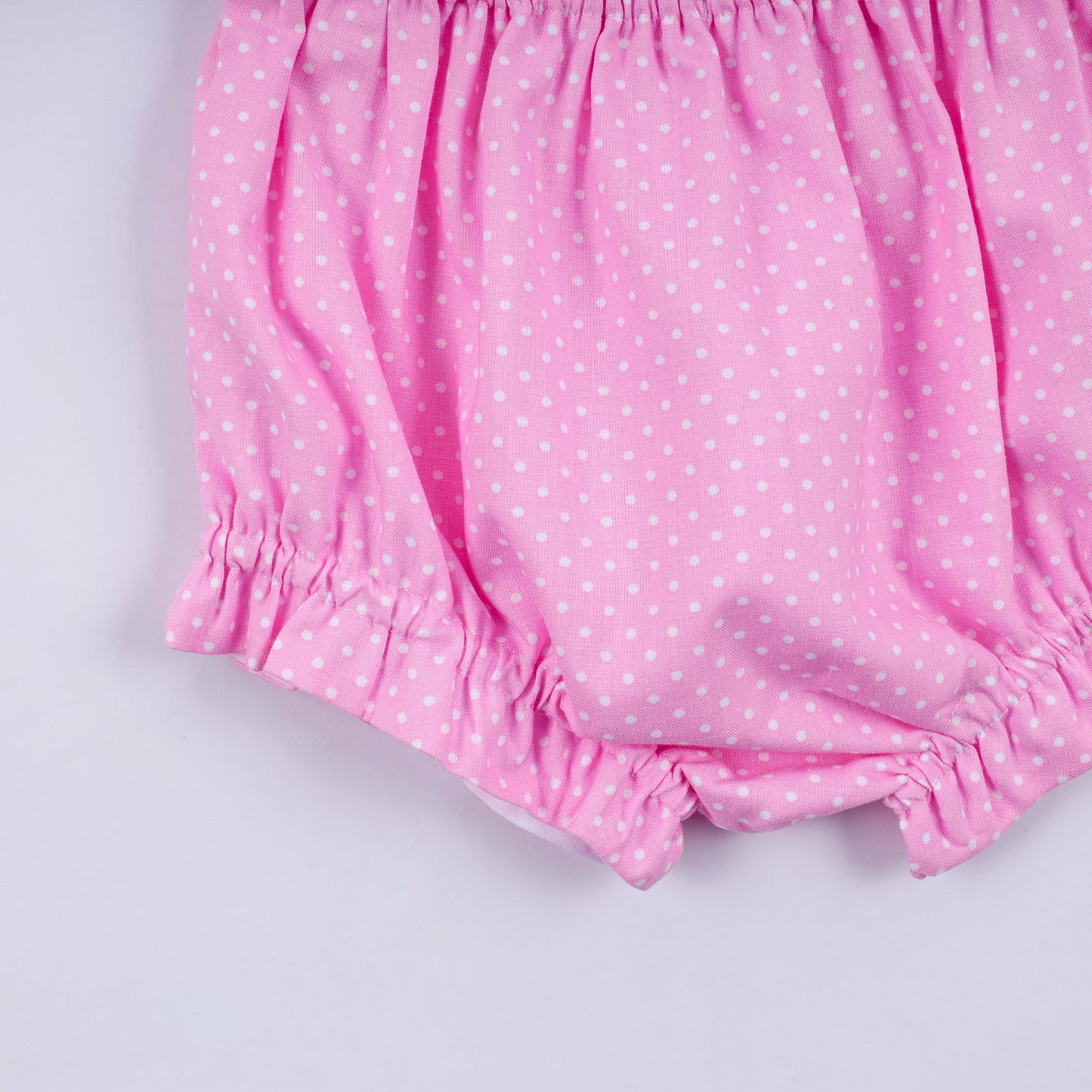 Pink character hand smocked dot ruffle bloomer set