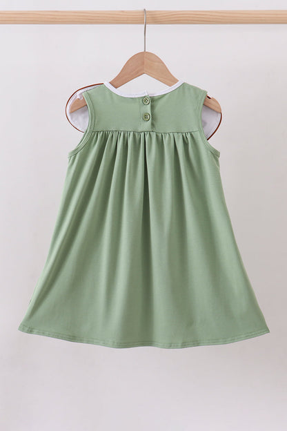 Green camoflage cross applique dress