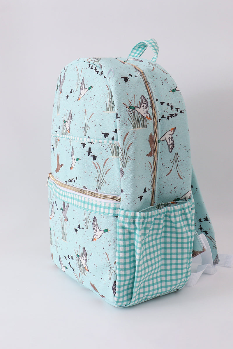 Green duck print backpack
