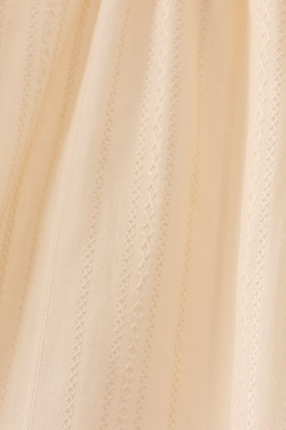 Oatmeal character french knot ruffle dress