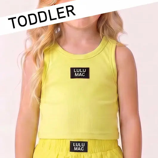 toddler girl wearing Lulu Mac yellow ribbed tank and matching shorts boutique summer outfit.